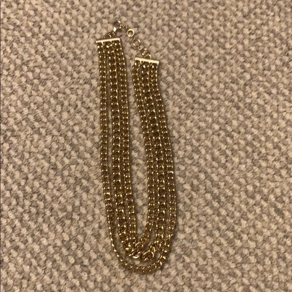 Three strand gold necklace